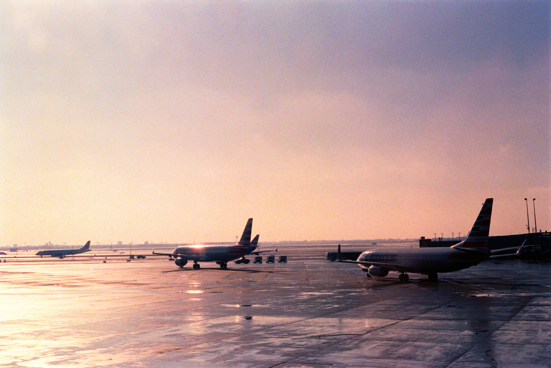 Airplanes parked on runway