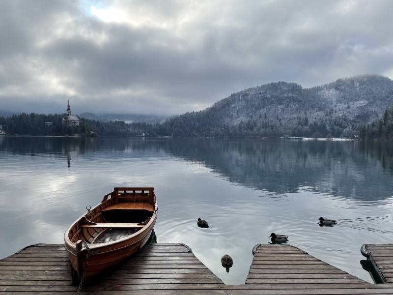 Boat parked at Lake Bled during winter