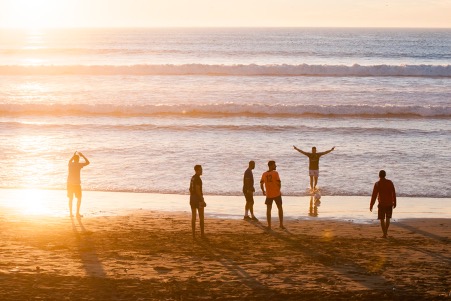 People on vacation playing at the beach 
